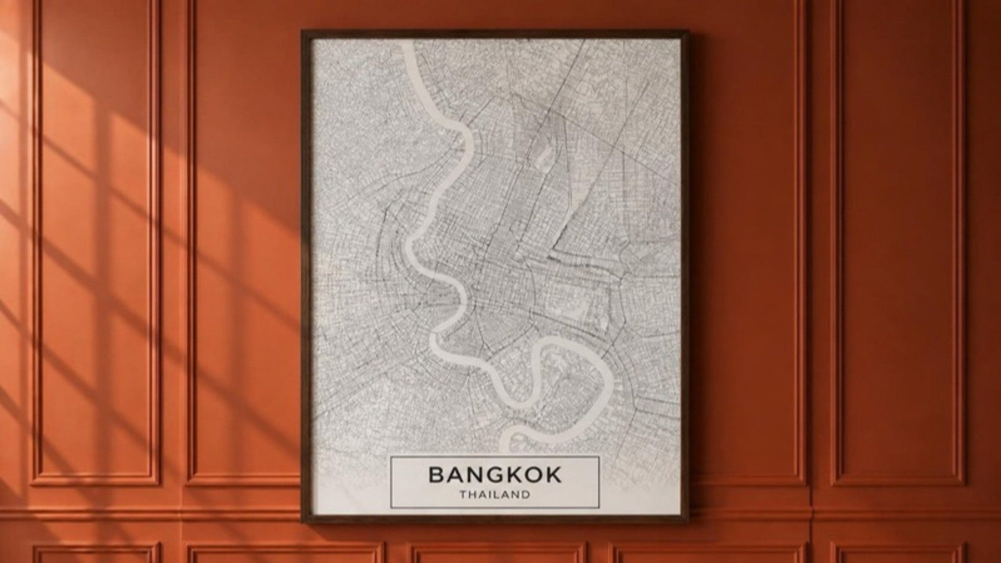 Framed Bangkok city map on a terracotta wall